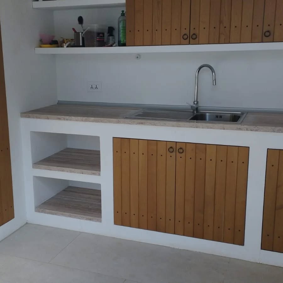Diseño y fabricación de cocina a medida con acabados en madera